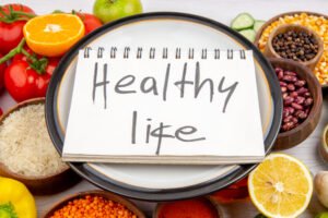 Blogs 16 side view healthy life inscription spiral notebook white pot collection fresh vegetables vegetarian dinner cooking white surface